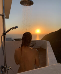 Roof terrace with outdoor shower and sunset during the Winter time